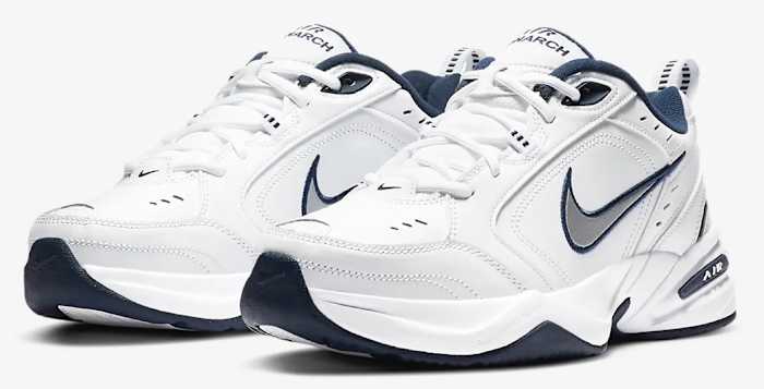 View of white and navy Nike shoes.